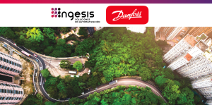 Vista aérea de entorno urbano y zona verde para ilustrar la eficiencia energética con variadores de frecuencia Danfoss